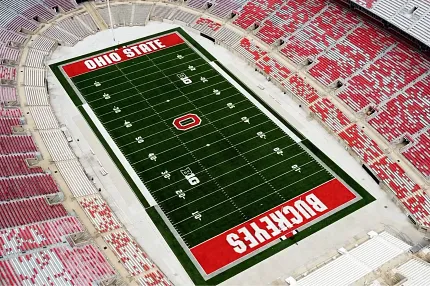 Ohio State Stadium Artificial Turf Field Aerial View Aerial view of Ohio State football stadium featuring artificial turf field with red and white seating