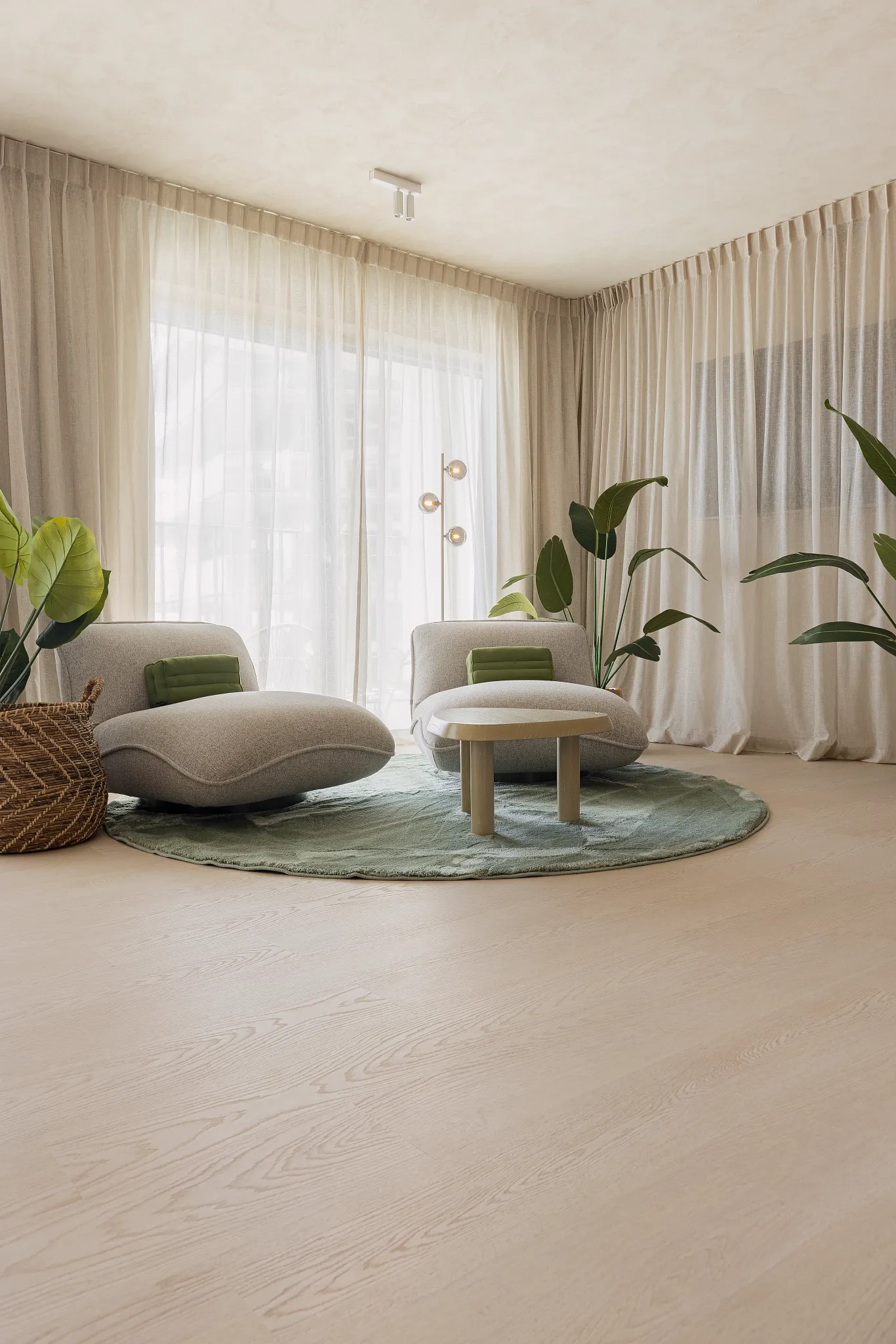 Seeting area with modern chairs, coffee table and light waterproof wooden Coretec floor