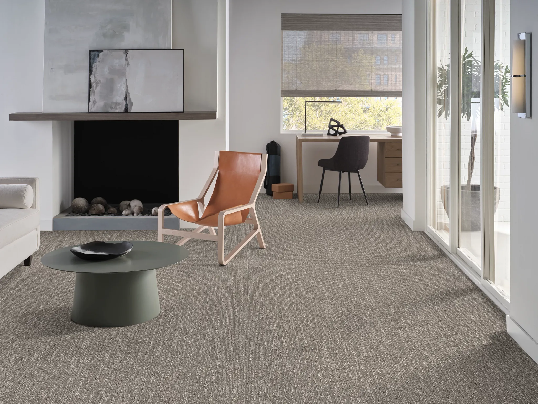 Modern living room with soft surface flooring and contemporary furniture