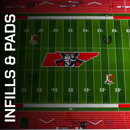 Artificial Turf Football Field with Red and Green Markings Aerial view of artificial turf football field with red and green markings