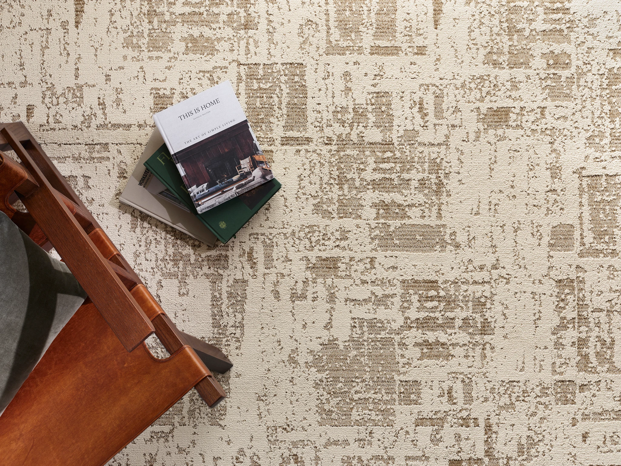 Broadloom carpet in beige with abstract pattern