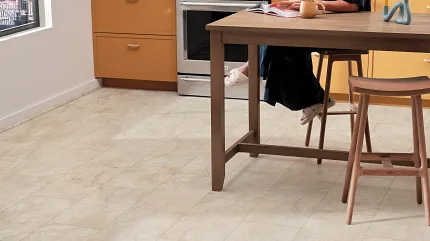 Coretec Residential WPC Luxury Vinyl Tile Flooring in Modern Kitchen - 24x12 inch Beige Tiles Modern kitchen with Coretec Residential WPC luxury vinyl tile flooring in beige tones, featuring 24x12 inch tiles