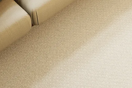 Beige armchair and textured carpet in living room scene Modern living room with beige armchair and textured carpet flooring