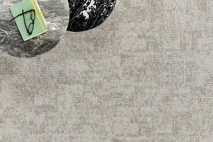 Beige Textured Commercial Carpet Tile with Marble Tables and Book Beige textured commercial carpet tile with marble tables and a book with glasses on top