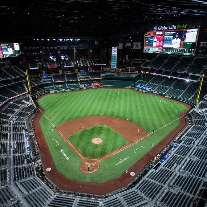 Baseball stadium with artificial turf field at Globe Life Field Aerial view of a baseball stadium with artificial turf field