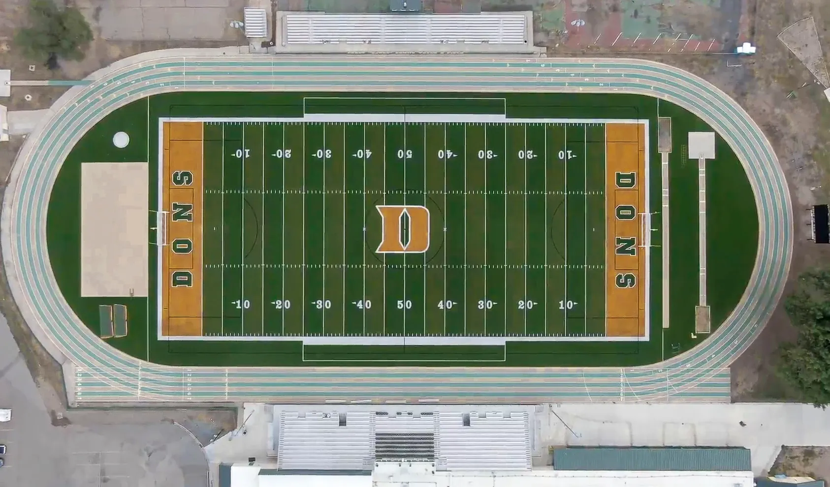 Aerial view of a football field with track