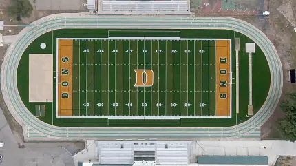 Sports complex with football field and track Aerial view of a football field with track