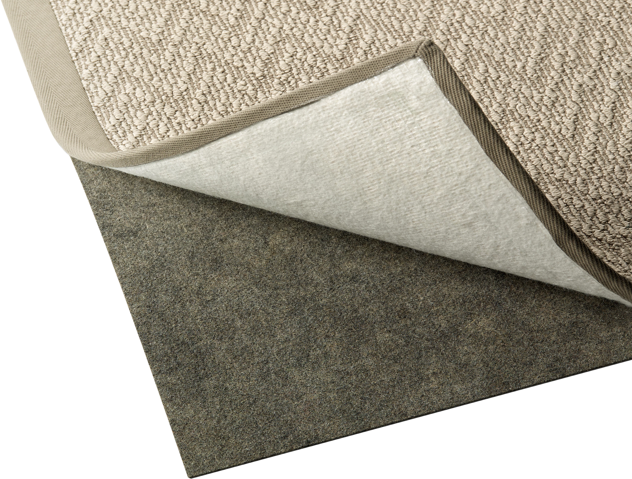 image of carpet pulled back to show rug pad