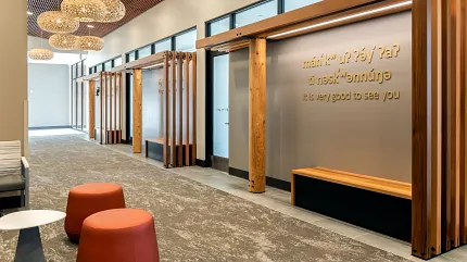 Stylish carpet flooring for contemporary commercial spaces Modern hallway with textured carpet flooring and wooden accents