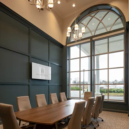 Stylish office space with contemporary design elements Elegant conference room with large windows and modern lighting