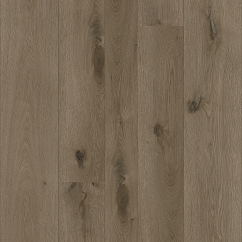 A medium brown vinyl floor in herringbone pattern