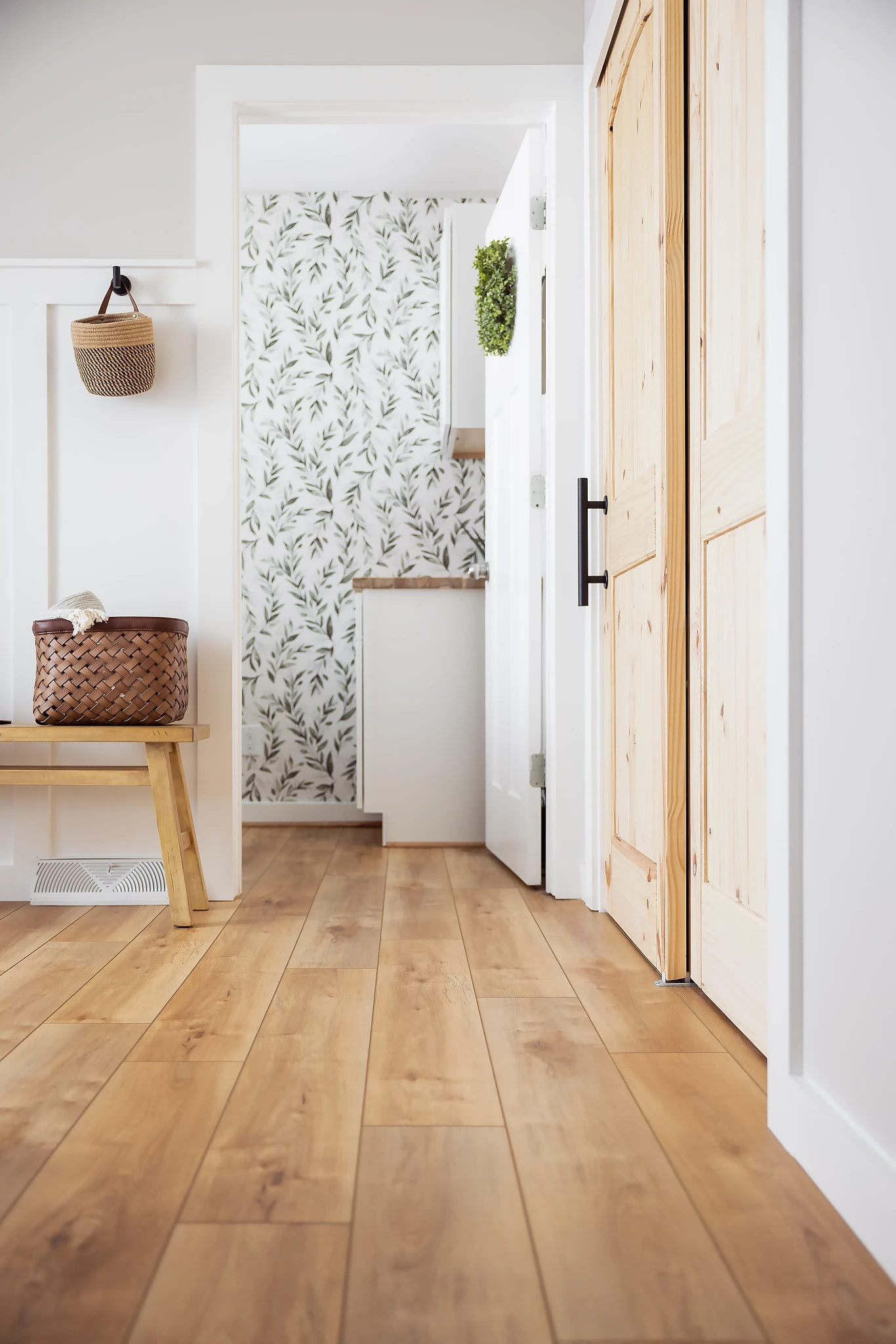 Modern hallway with wood look luxury vinyl plank flooring
