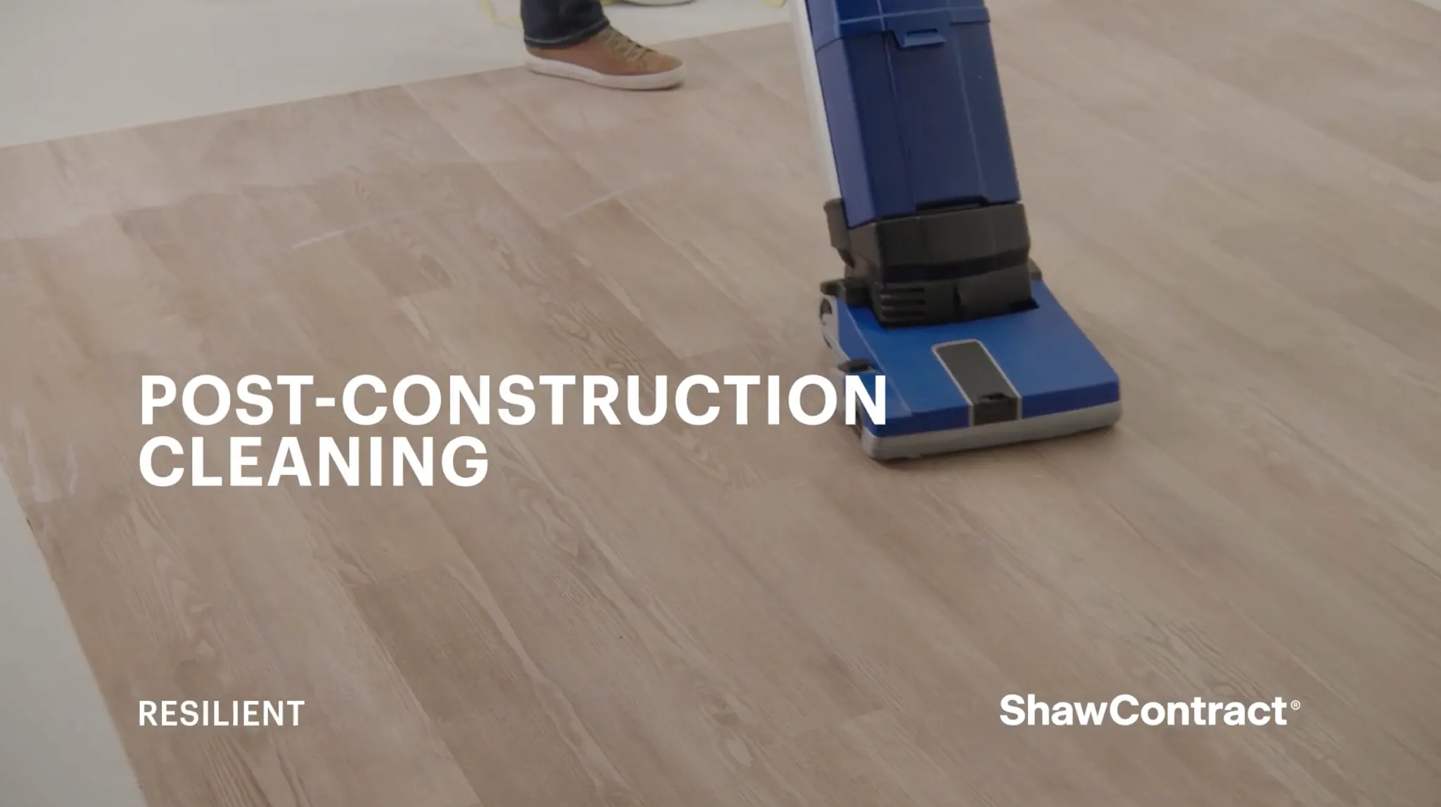 Resilient flooring being cleaned post-construction