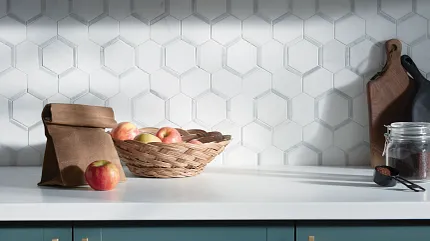 Stylish kitchen featuring white hexagonal tile backsplash and teal cabinetry for a contemporary look Modern kitchen with white hexagonal tile backsplash and teal cabinets