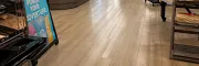 Durable Rigid Mineral Core flooring for commercial spaces Rigid Core flooring in a grocery store setting