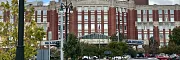 Henry Ford Hospital exterior view - Healthcare Facility. Exterior view of Henry Ford Hospital building with red brick facade and multiple windows, Healthcare Facility building exterior view.