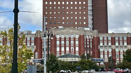 Henry Ford Hospital exterior view - Healthcare Facility. Exterior view of Henry Ford Hospital building with red brick facade and multiple windows, Healthcare Facility building exterior view.