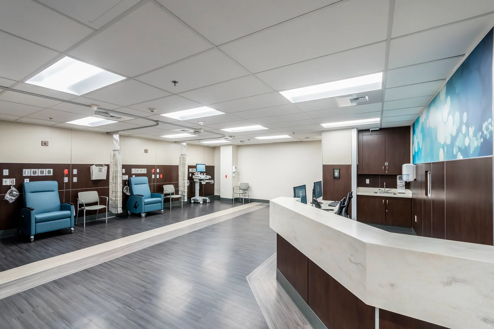 Healthcare facility with heavy commercial luxury vinyl tile flooring in a modern reception area, featuring 36x9 inch dimensions