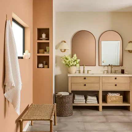 Stone Look Luxury Vinyl Tile Flooring in Modern Bathroom. Modern bathroom with stone look luxury vinyl tile flooring, featuring a double vanity and woven basket decor.
