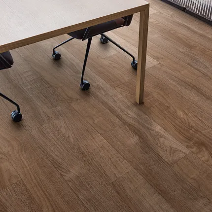 Light Wood Look LVP Flooring in Contemporary Dining Space Modern dining area with light wood look luxury vinyl plank flooring and black leather chairs