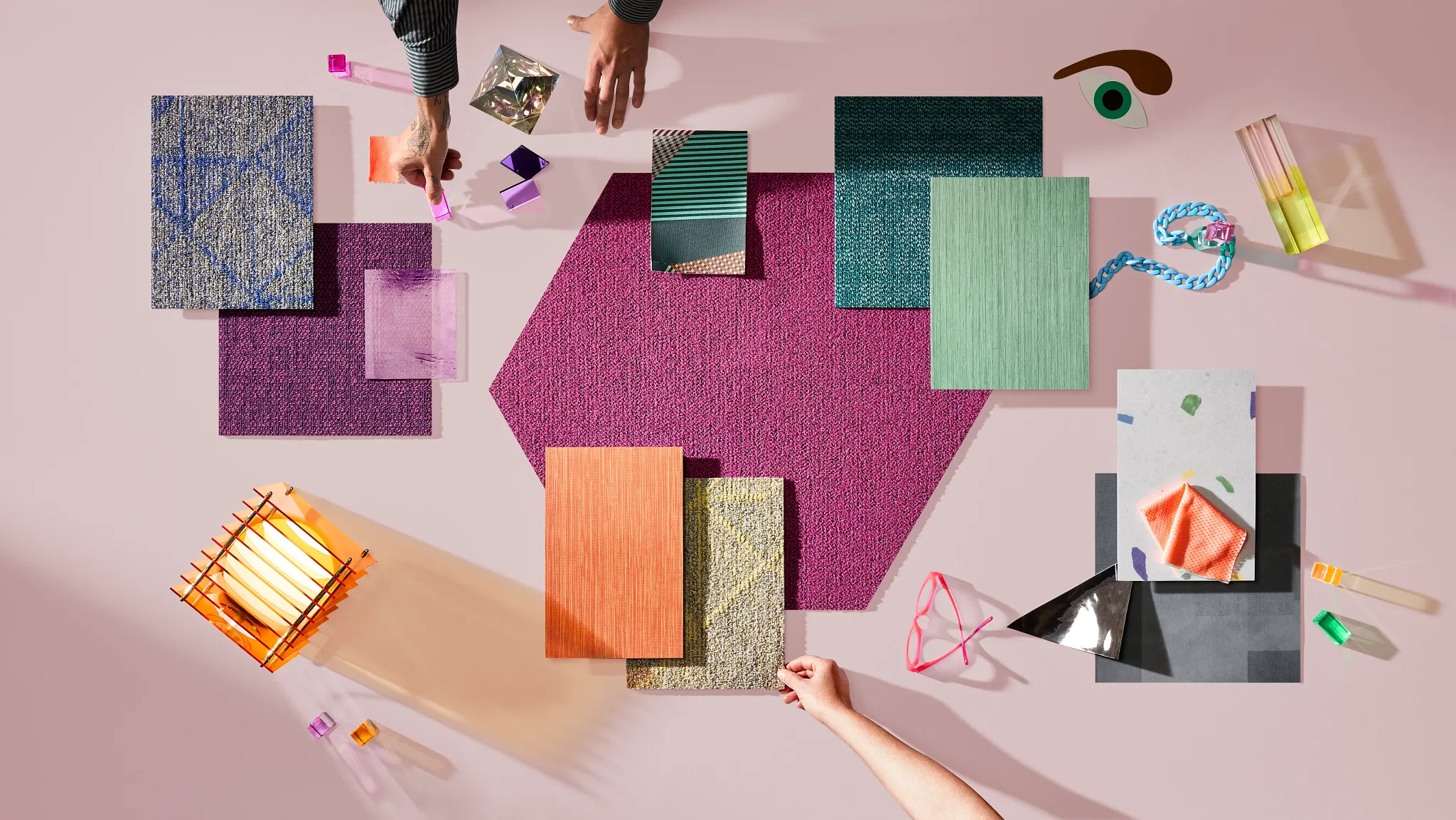 Pink, gray, purple yellow carpet and LVT tile palette with decor items