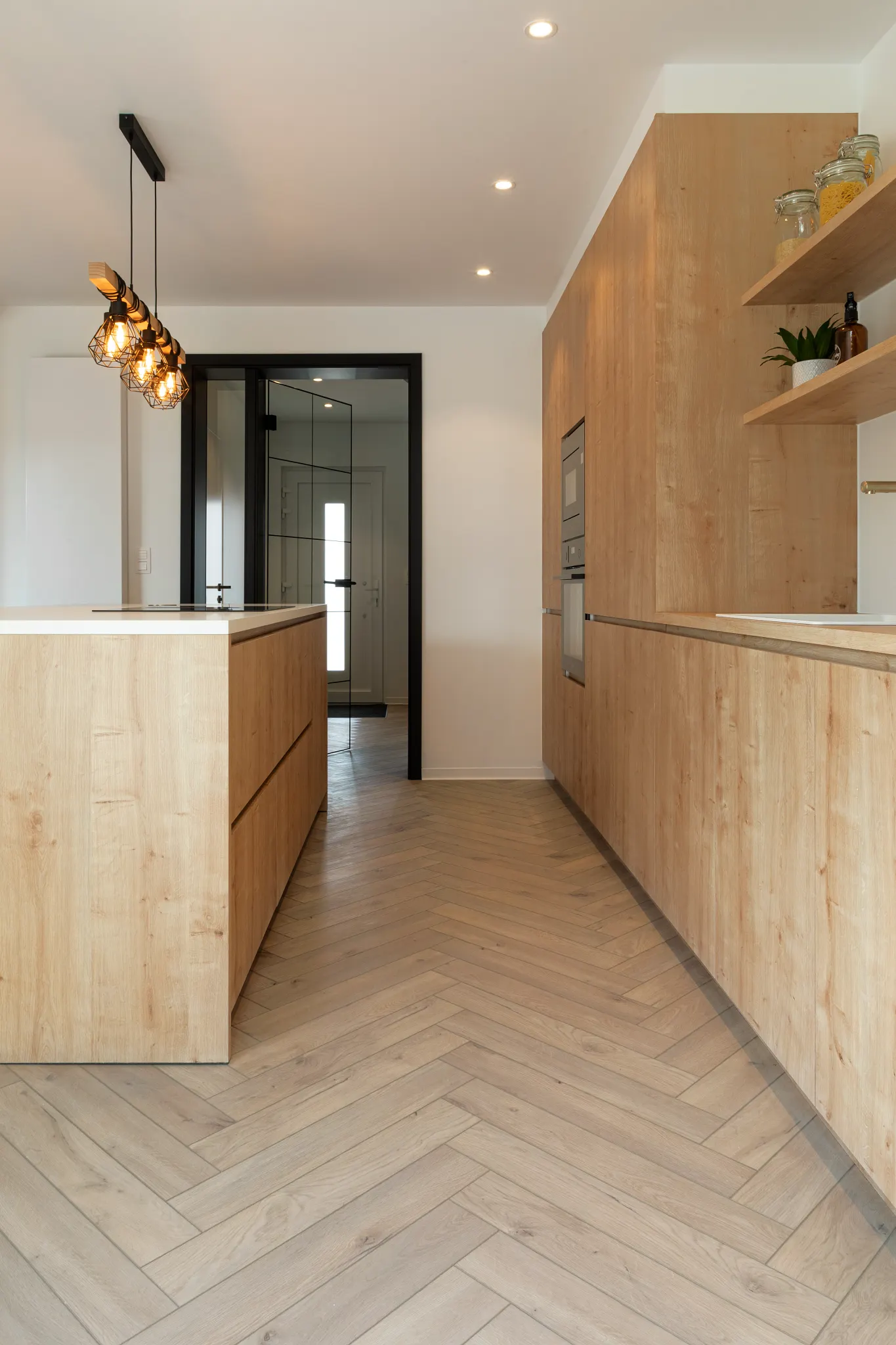 Country kitchen with wooden herringbone flooring from Coretec 