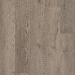A light brown vinyl floor with wood grain pattern