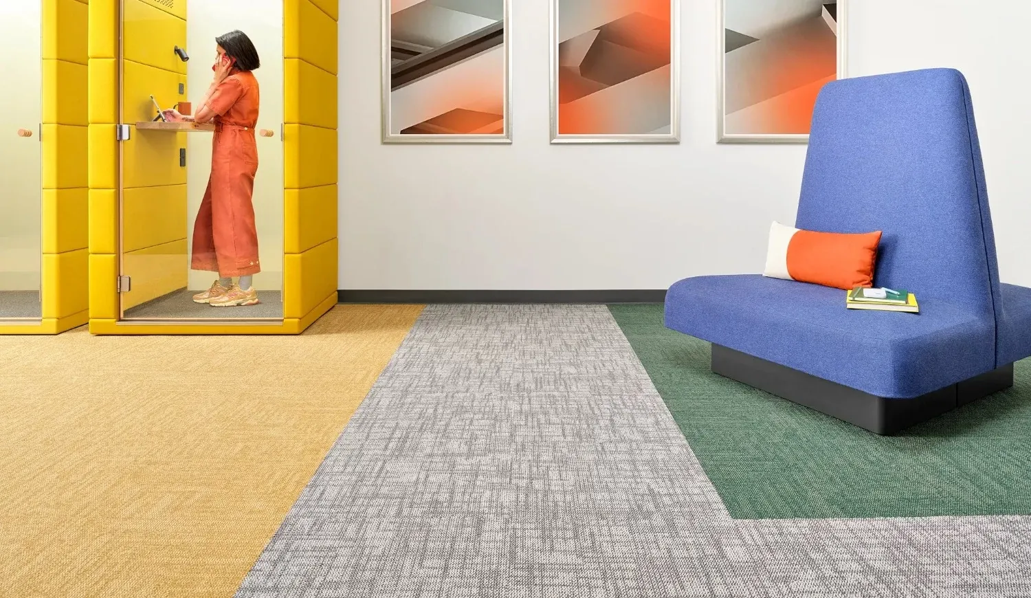 Modern office space with yellow, gray, and green carpet tiles