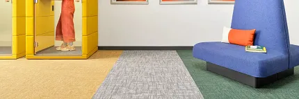 Stylish carpet tile design for contemporary workspaces Modern office space with yellow, gray, and green carpet tiles