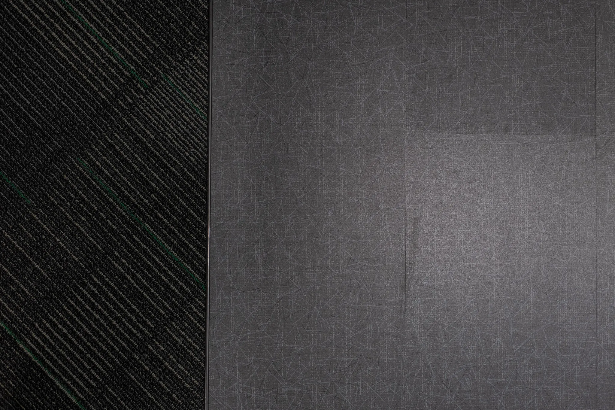 Heavy commercial luxury vinyl tile swatch in dark tones
