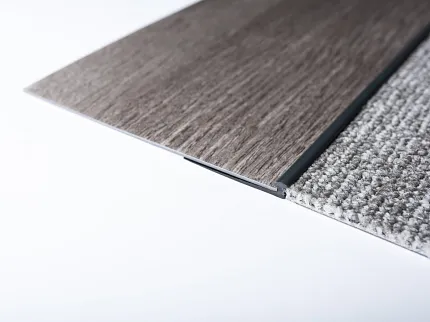 Versatile flooring solution with seamless carpet integration Close-up of hard surface flooring with carpet transition