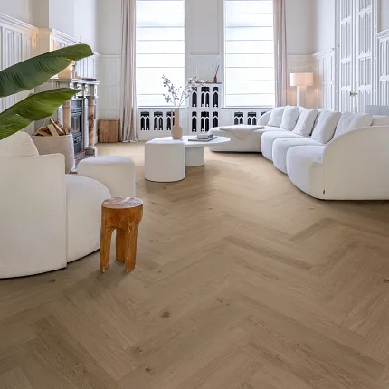 Luxury Vinyl Plank Flooring in Modern Living Room with Wood Look Design living room with luxury vinyl plank floor in a wood look design with a stylish black chair and artwork on white brick walls