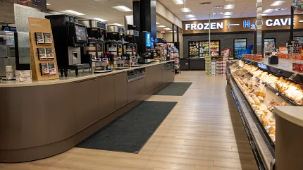 Durable Rigid Core flooring with 47.55x5.66 inch dimensions Rigid Core flooring in a grocery store setting