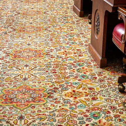 Luxurious carpet design for elegant interiors Ornate carpet with floral patterns in a traditional setting