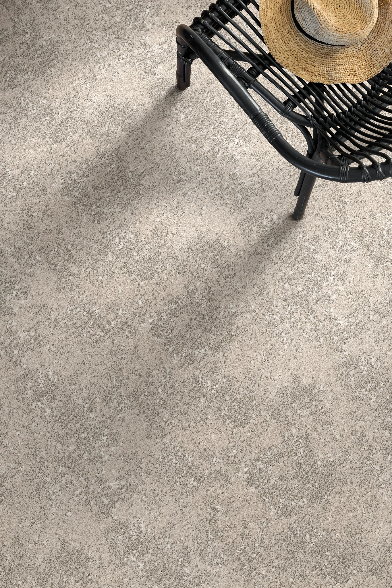 Broadloom carpet in shades of beige with textured pattern