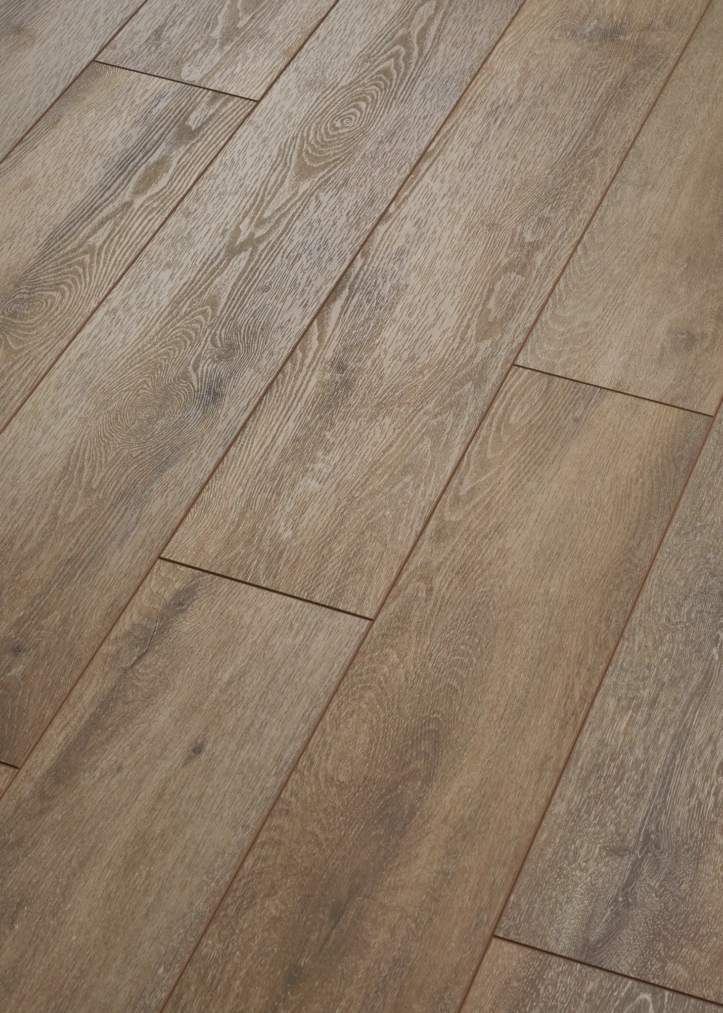 Wood look luxury vinyl plank flooring in natural oak color with realistic grain patterns