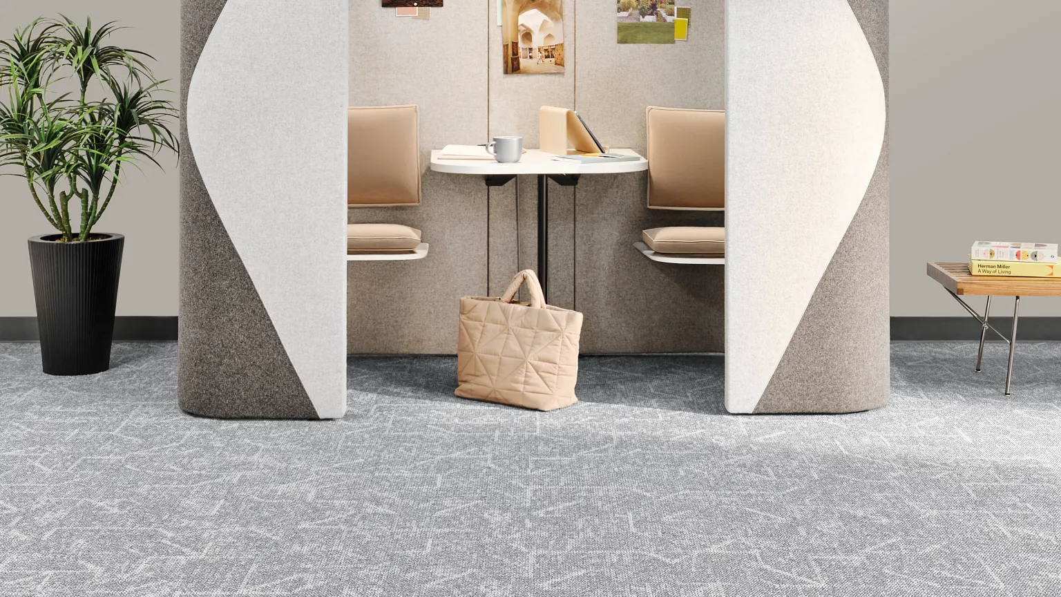 Private working spaces with two seats, a table, and grey carpet tile