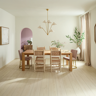 Artistic dining room featuring soft pastel colors on COREtec flooring