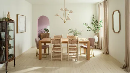 Light Wood Look Luxury Vinyl Plank Flooring in Modern Dining Room Modern dining room with light wood look luxury vinyl plank flooring, featuring a wooden dining table and chairs, a glass cabinet, and a contemporary chandelier.