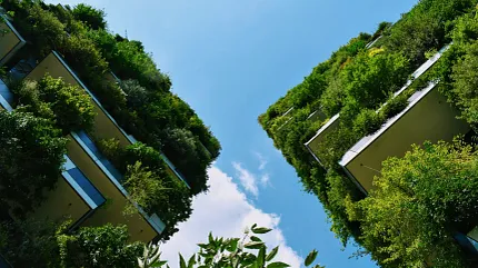 Green Building Design and Sustainable Architecture | Shaw Contract Australia Multi-storey buildings covered in vegetation showcasing biophilic design and sustainable architecture