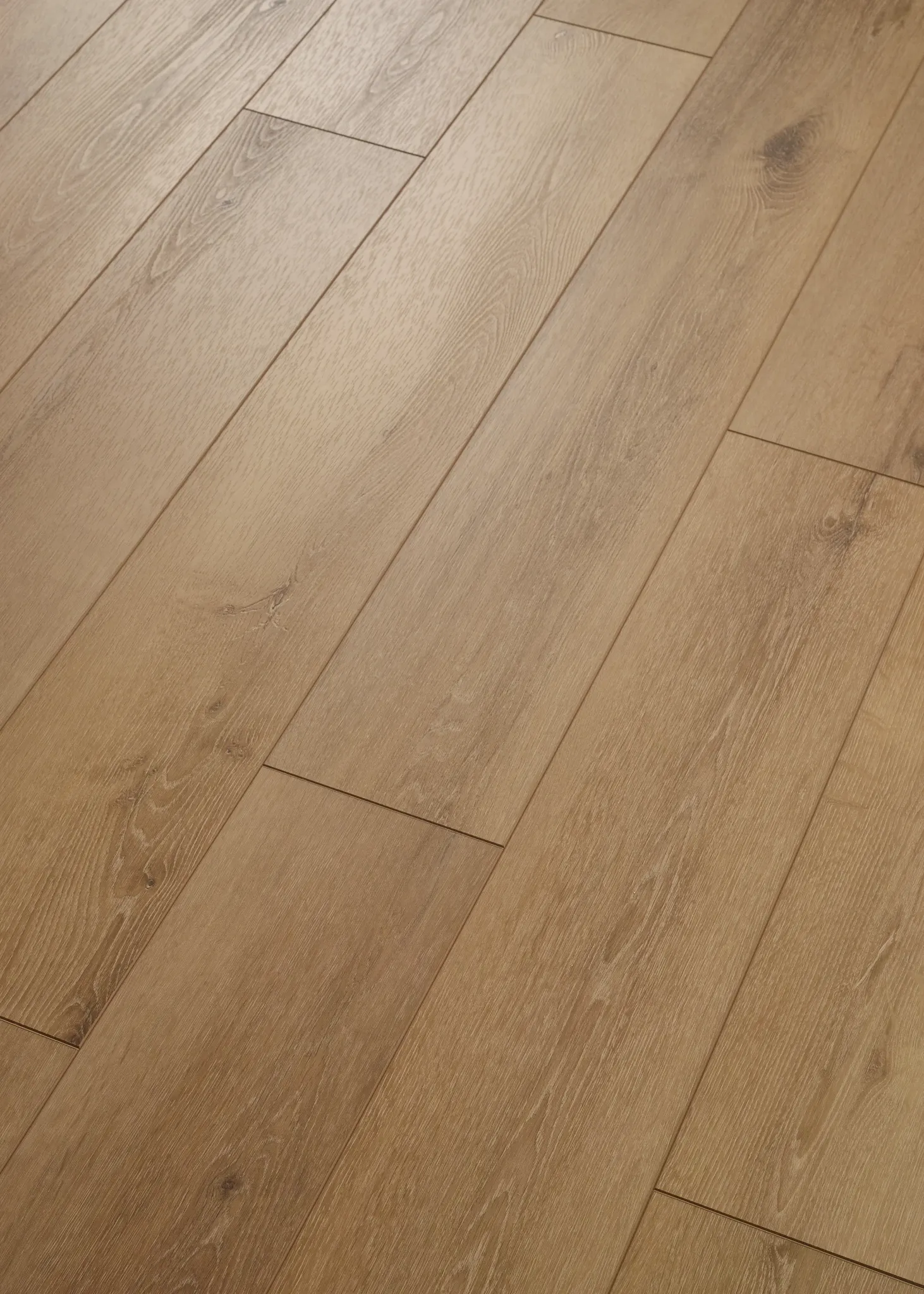 Luxury vinyl plank flooring in warm oak color with Sound Core technology