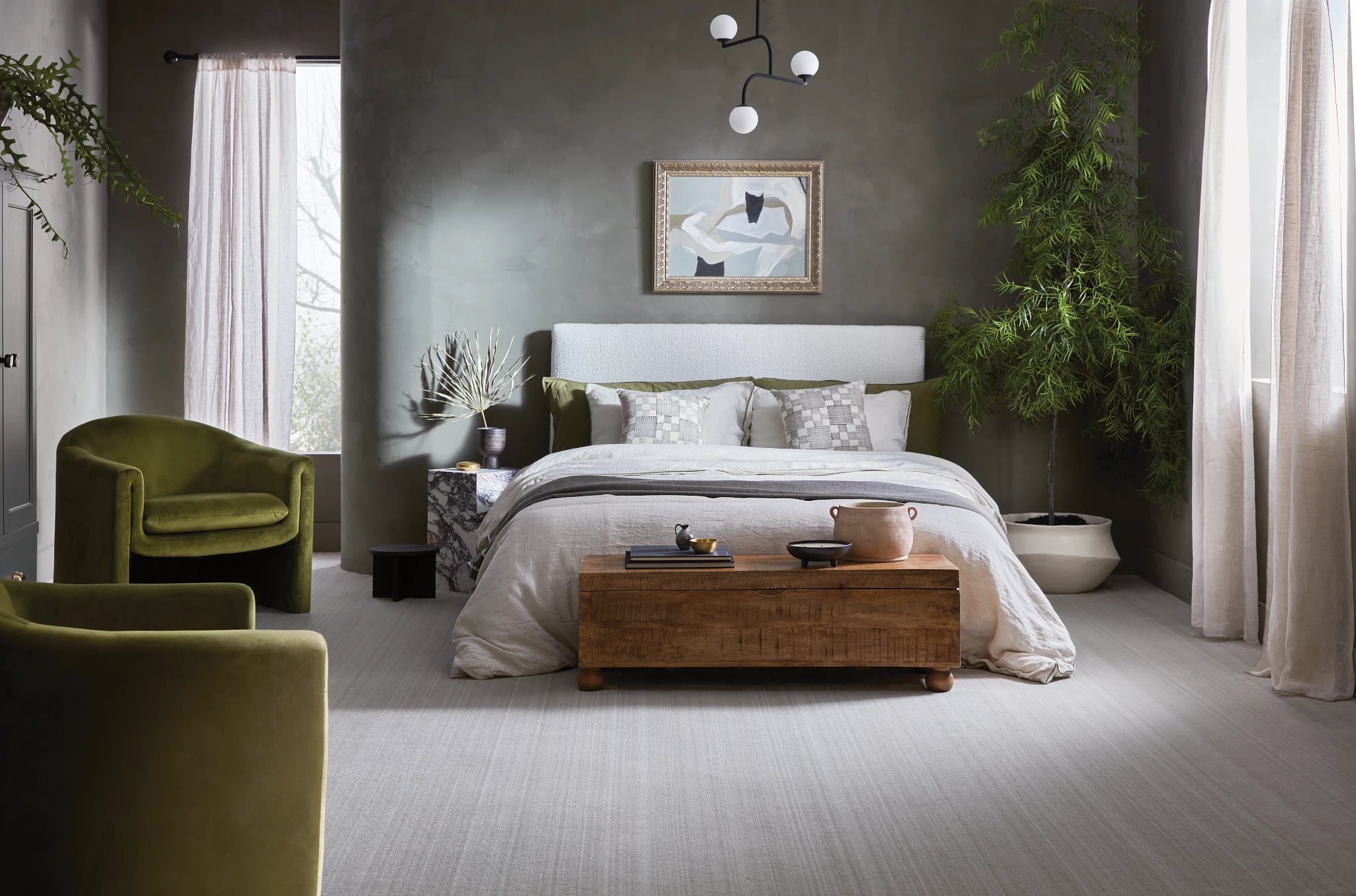 Elegant bedroom featuring a 12 ft wide broadloom carpet in a serene gray tone