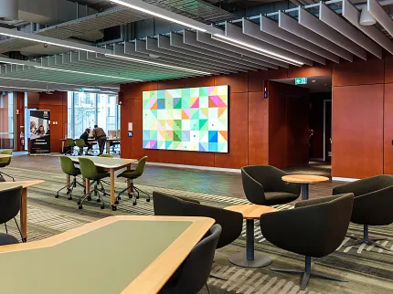 University of Tasmania Learning Environment Featuring Custom Flooring Design | Shaw Contract Collaborative learning space at the University of Tasmania featuring custom patterned carpet flooring, flexible study areas and contemporary educational interiors.