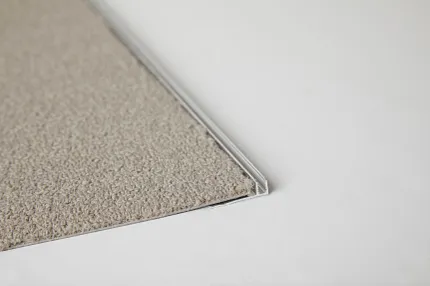 Beige Commercial Carpet Tile Swatch with Edge Detail Beige commercial carpet tile swatch with visible edge detail