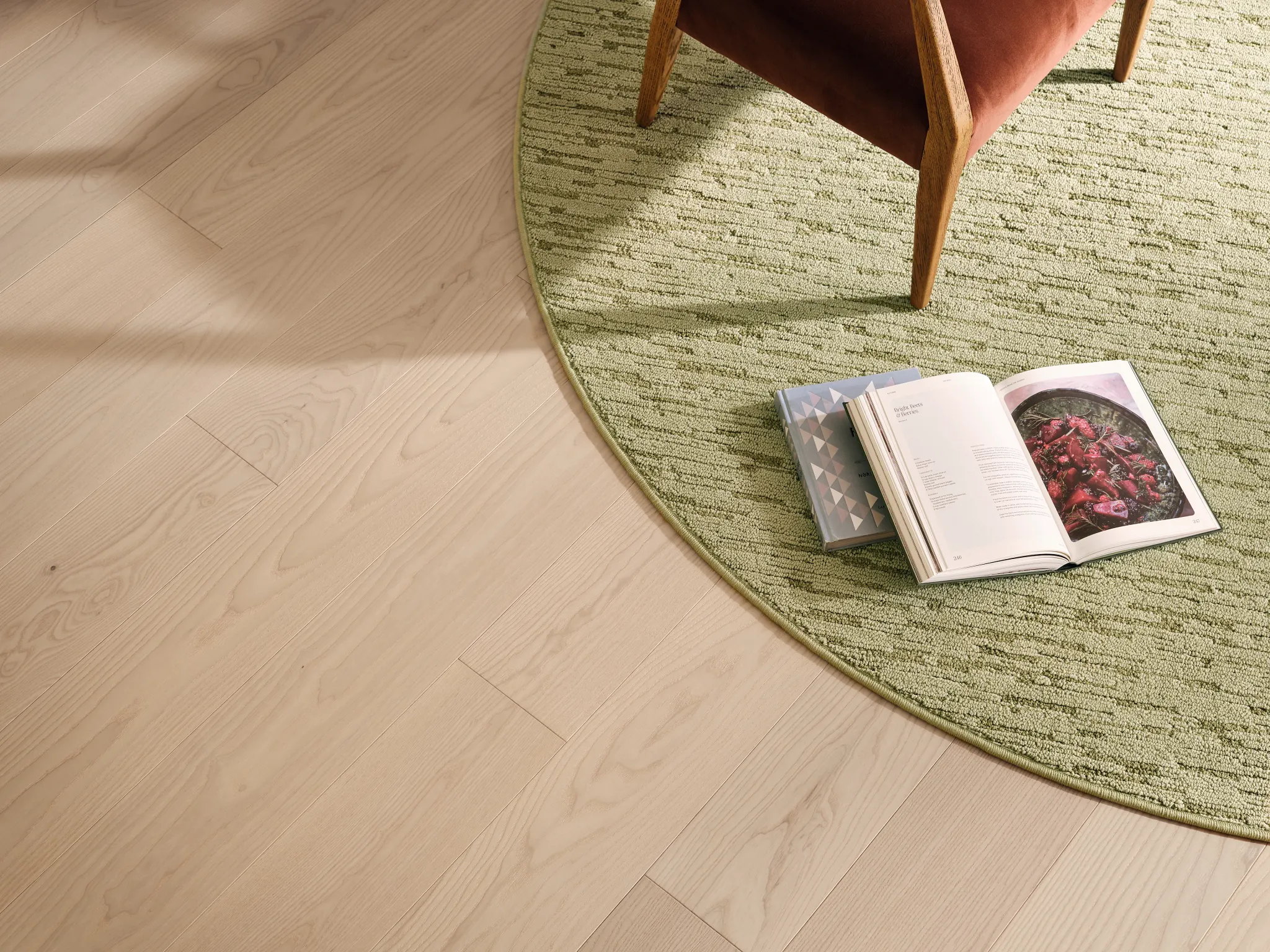 Room scene with a green synthetic carpet and a wooden chair