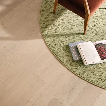 Green synthetic carpet in a modern room setting Room scene with a green synthetic carpet and a wooden chair