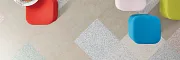 Durable LVT flooring for versatile spaces Heavy commercial luxury vinyl tile flooring in assorted colors with modern seating