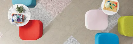 Durable LVT flooring for versatile spaces Heavy commercial luxury vinyl tile flooring in assorted colors with modern seating