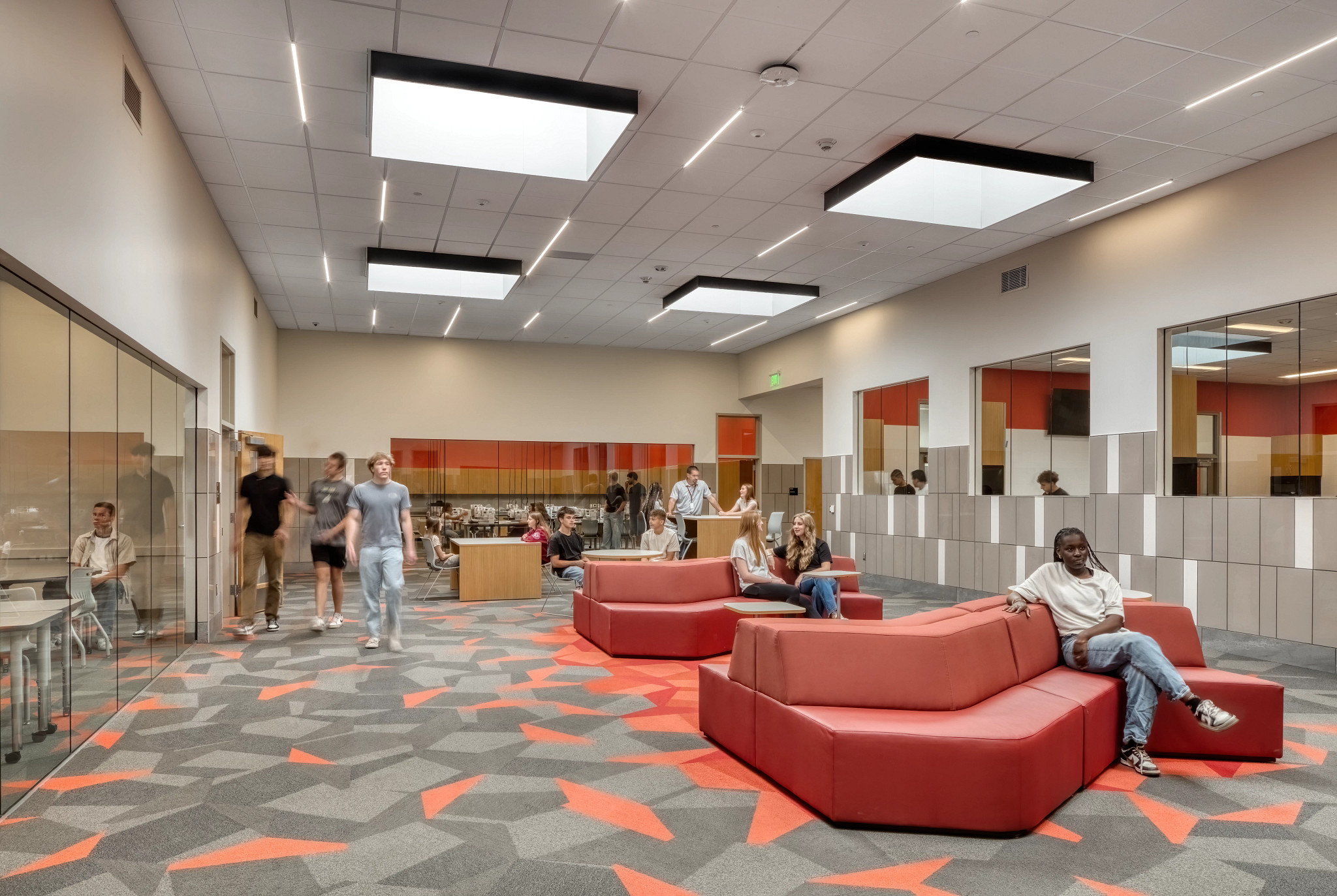 K-12 Collaborative Space with black, gray, and red carpet tile 