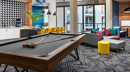 Stylish carpet flooring for contemporary game rooms Modern game room with geometric patterned carpet flooring